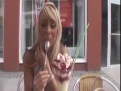 In a toilet, a tanned old slut drilled bad in a dog stance.